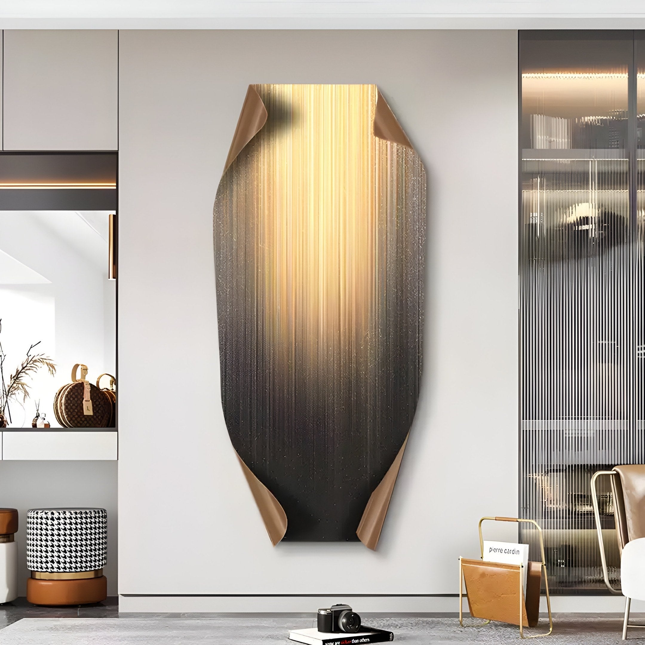 A modern living room features Giant Sculptures Celestial Midnight Gradient Edge Folded Abstract Metal Wall Art, with golden streaks and curled edges. A woven basket, cushions, and a small side table enhance the cozy, contemporary atmosphere.