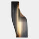 The Celestial Gold Radiance Curved Angled Abstract Metal Wall Art by Giant Sculptures features a tall, abstract black and gold design with linear patterns, evoking celestial radiance against a plain white background.