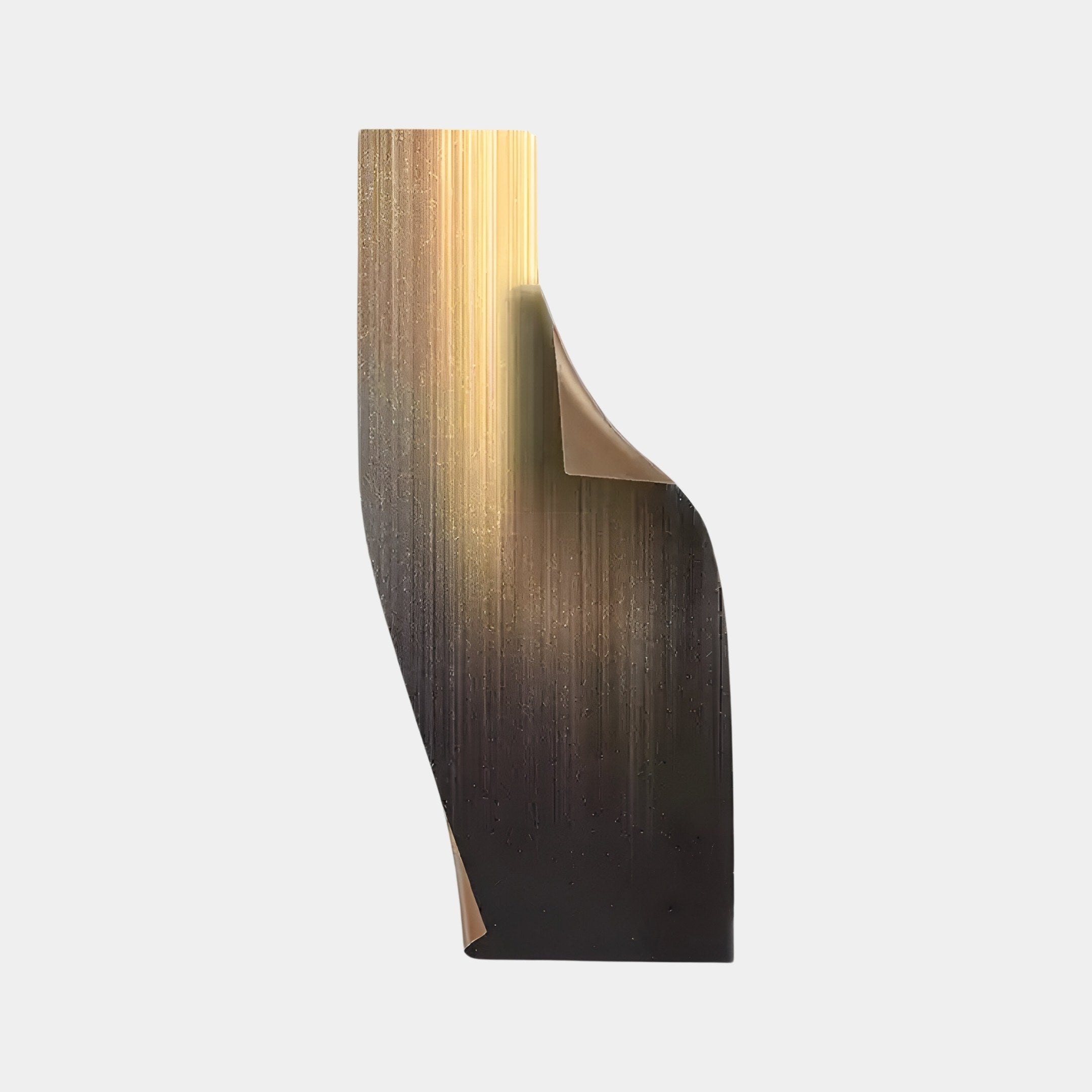 The Celestial Midnight Gradient Curved Angled Abstract Metal Wall Art by Giant Sculptures is a tall, flowing piece with a golden to dark hue, perfect for modern interiors. Its smooth gradient and subtle texture add sophistication against a plain, light background.