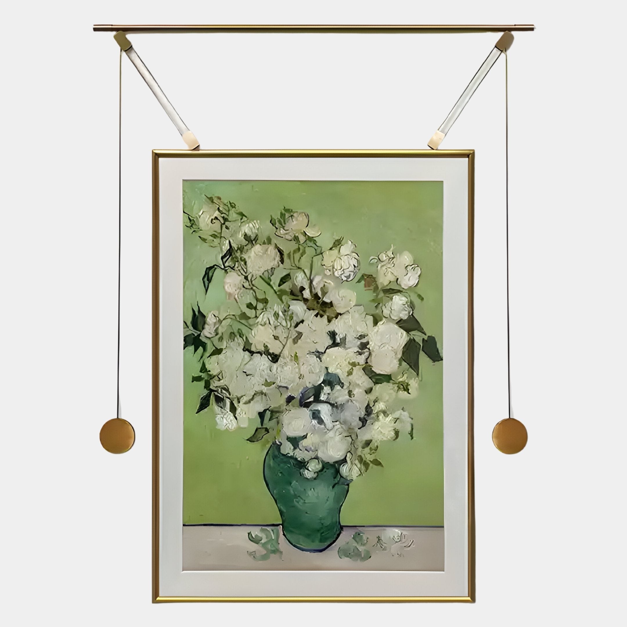 The Reverra White Blossoms Hanging Frame Wall Art by Giant Sculptures features white flowers in a green vase, displayed on a light green background with a decorative hanging frame, gold picture light above, and two gold weights at each side.