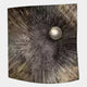 The Astralis Bronze Cosmic Drift Abstract 3D Wall Art by Giant Sculptures features a metallic, textured square design with burst patterns and an off-center silver sphere—an eye-catching statement piece for any space.