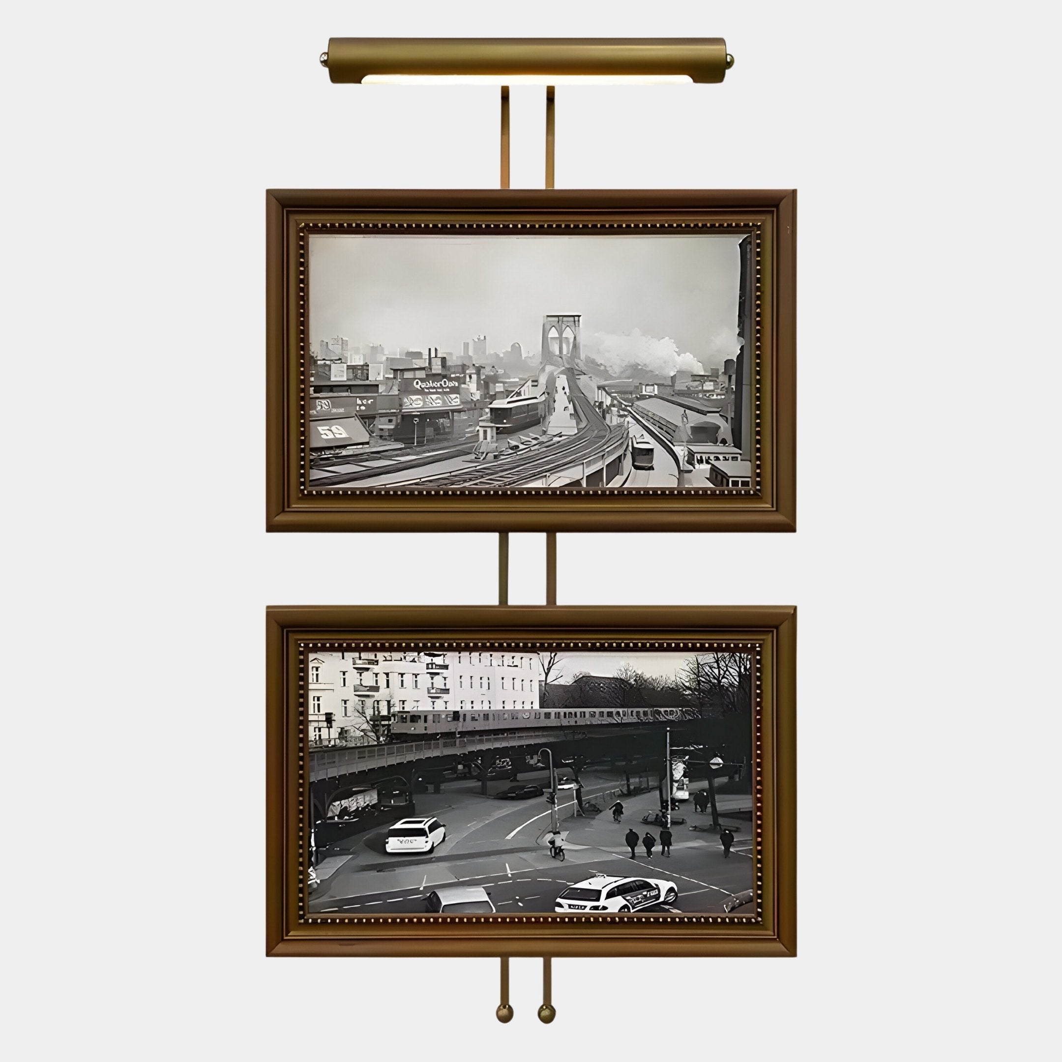The Giant Sculptures Artisera Urban Vistas Antique Dual Frame Built-In Light Wall Art hangs on a wall, featuring black-and-white cityscape photos—one of a bridge and city above, and one of a street scene below.