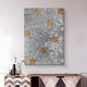 The Prismatica Gold & Silver Mosaic 3D Wall Art by Giant Sculptures features textured squares and hangs above a modern console table. The table, adorned with a mosaic pattern, displays metallic-hued vases and cotton branches.