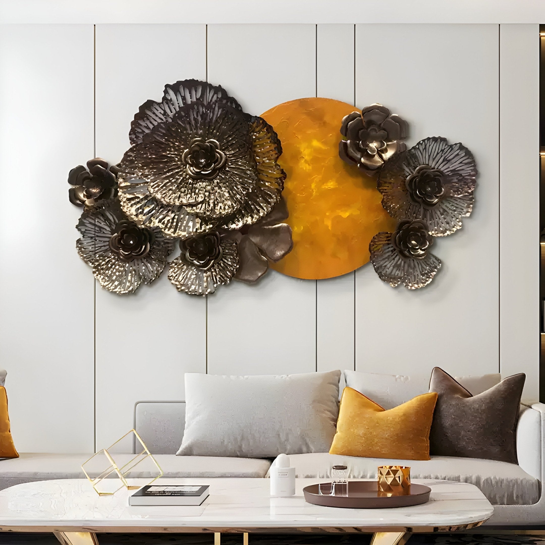 A modern living room showcases a white couch with neutral-toned pillows. On the wall, the Luminis Bloom Yellow Floral Metal Wall Art by Giant Sculptures serves as a striking artistic focal point, with metallic blooms and a circular orange element for timeless elegance.