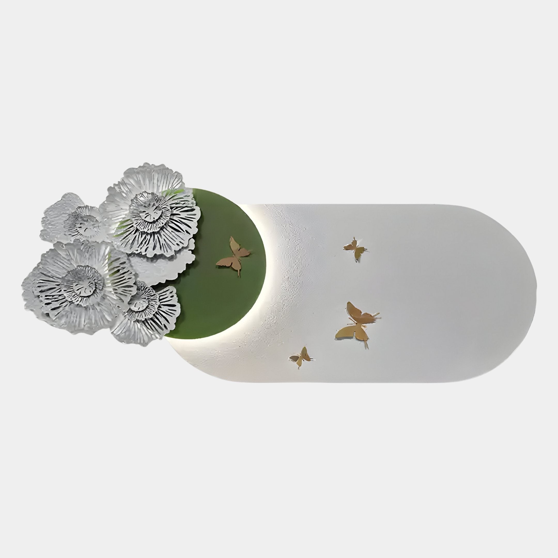 The Flutter Bloom Green Butterfly Floral 3D Wall Art by Giant Sculptures features white floral designs on a green and white oval base, accented with gold butterflies and soft lighting for an elegant, nature-inspired decor.