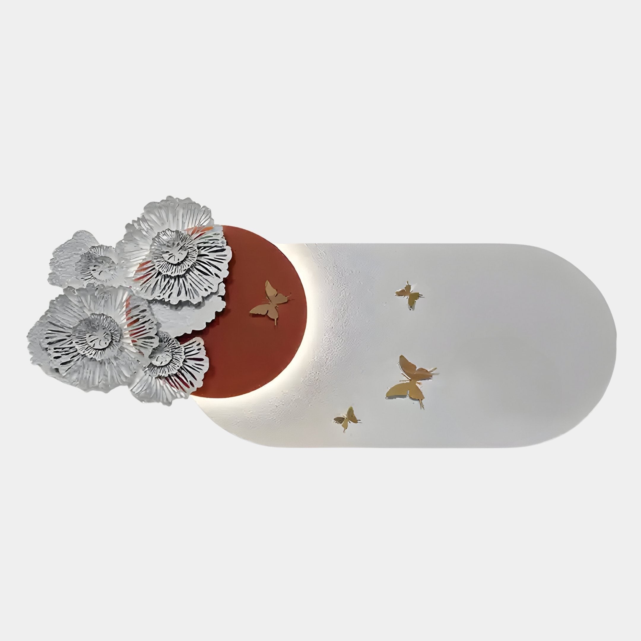 The Giant Sculptures Flutter Bloom Terracotta Butterfly Floral 3D Wall Art features white textured flowers on a red circle and a smooth butterfly floral oval with gold accents, making it perfect for elegant, nature-inspired decor.