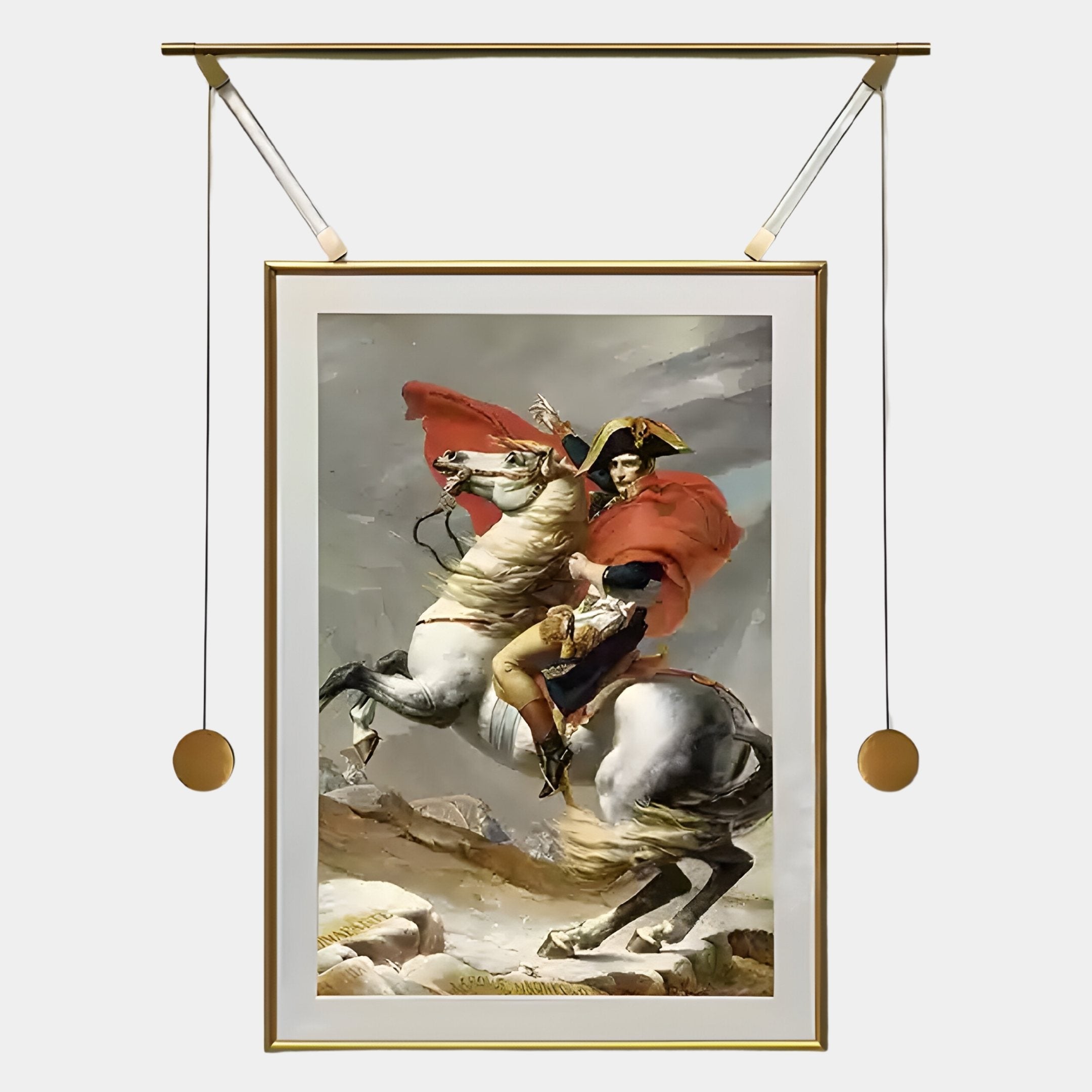 The Aristo Napoleon On Horseback Painting Gold Frame Hanging Wall Art by Giant Sculptures features Bonaparte in a red cape and uniform against moody clouds, elegantly suspended from a gold rod with decorative weights.
