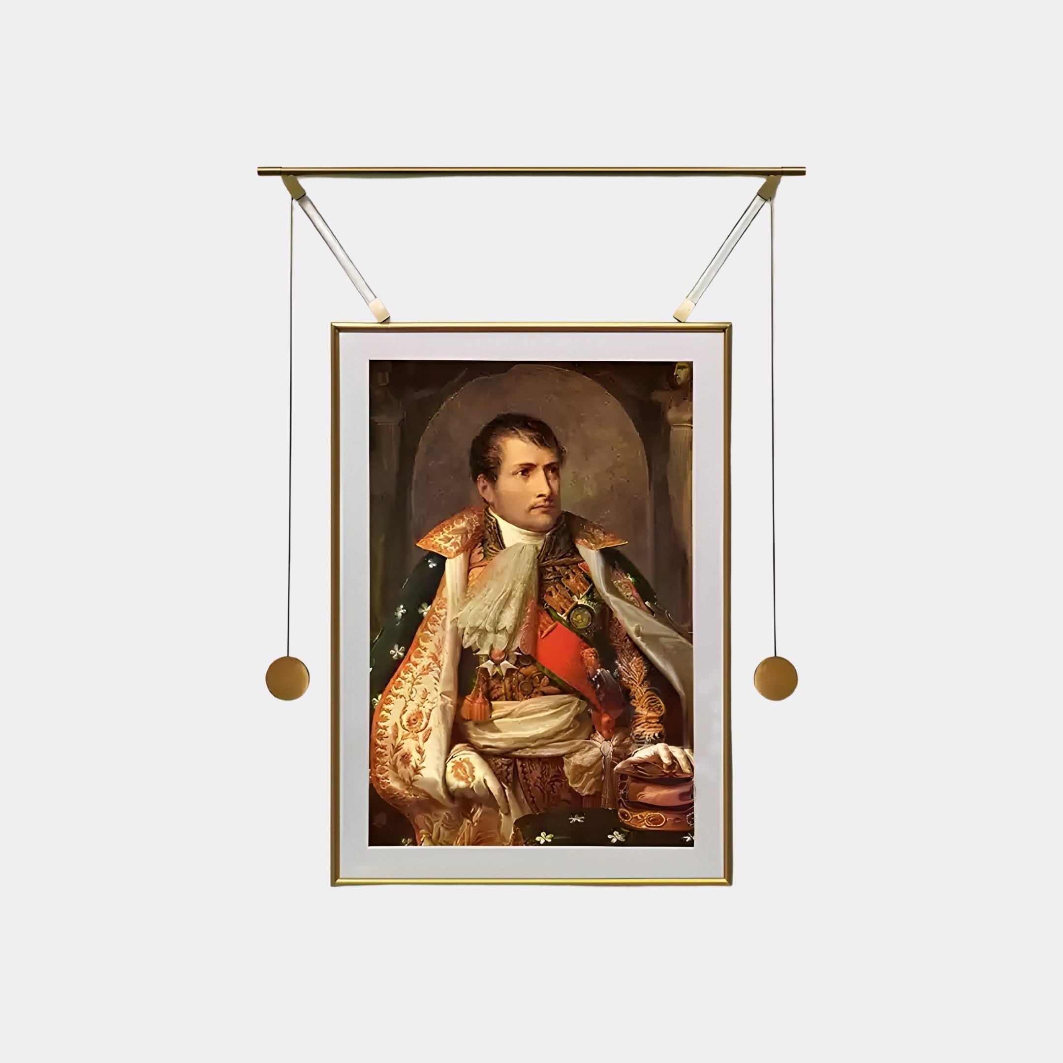 This Aristo Napoleon Portrait Painting by Giant Sculptures showcases a historical figure in ornate military attire with a sash and decorations, gazing to the side against rich drapery and a classical backdrop. Elegantly displayed in a modern gold frame.