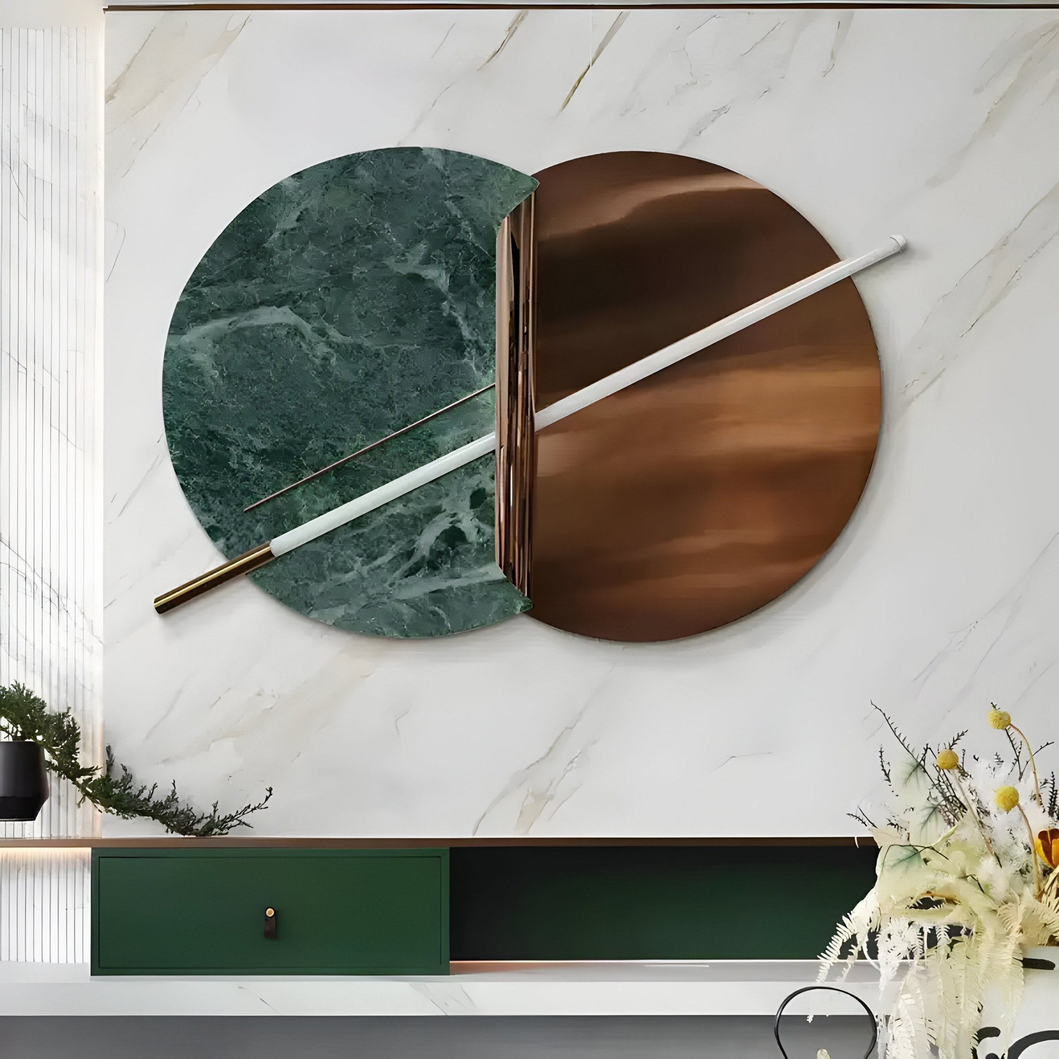 The Lunaris Green Marble & Bronze LED Wall Art by Giant Sculptures exudes modern elegance with overlapping Lunaris Green Marble and copper circular panels. Two metallic rods cross diagonally over the circles, and a green shelf below holds decorative plants for a stylish display.