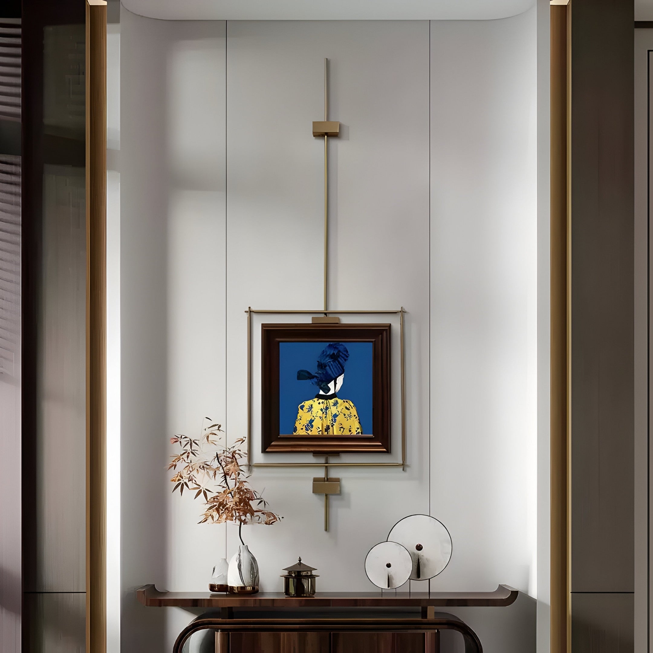 A modern interior features a small, dark wooden table with abstract decor against a light wall. Hanging above is the Ethereal Frames Regal Blue Portrait by Giant Sculptures, showcasing a person in yellow attire. Natural light casts subtle shadows, enhancing the rooms elegance and charm.