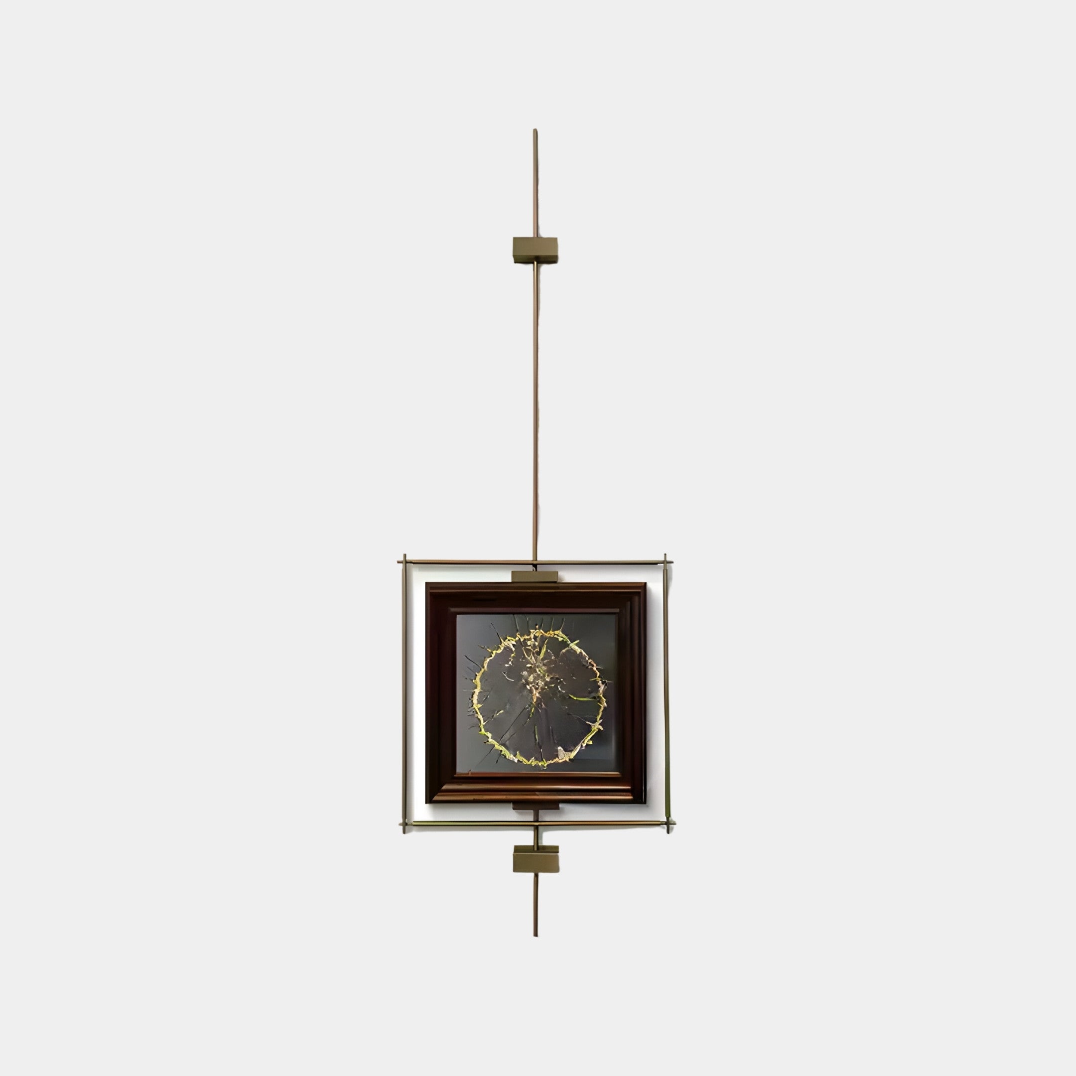 The Ethereal Frames Golden Tree Classic Suspended Wall Art by Giant Sculptures features a medieval-inspired design with a central circular piece of intricate gold and dark patterns. Mounted on a vertical metal rod with geometric elements, it evokes the elegance of suspended wall art.