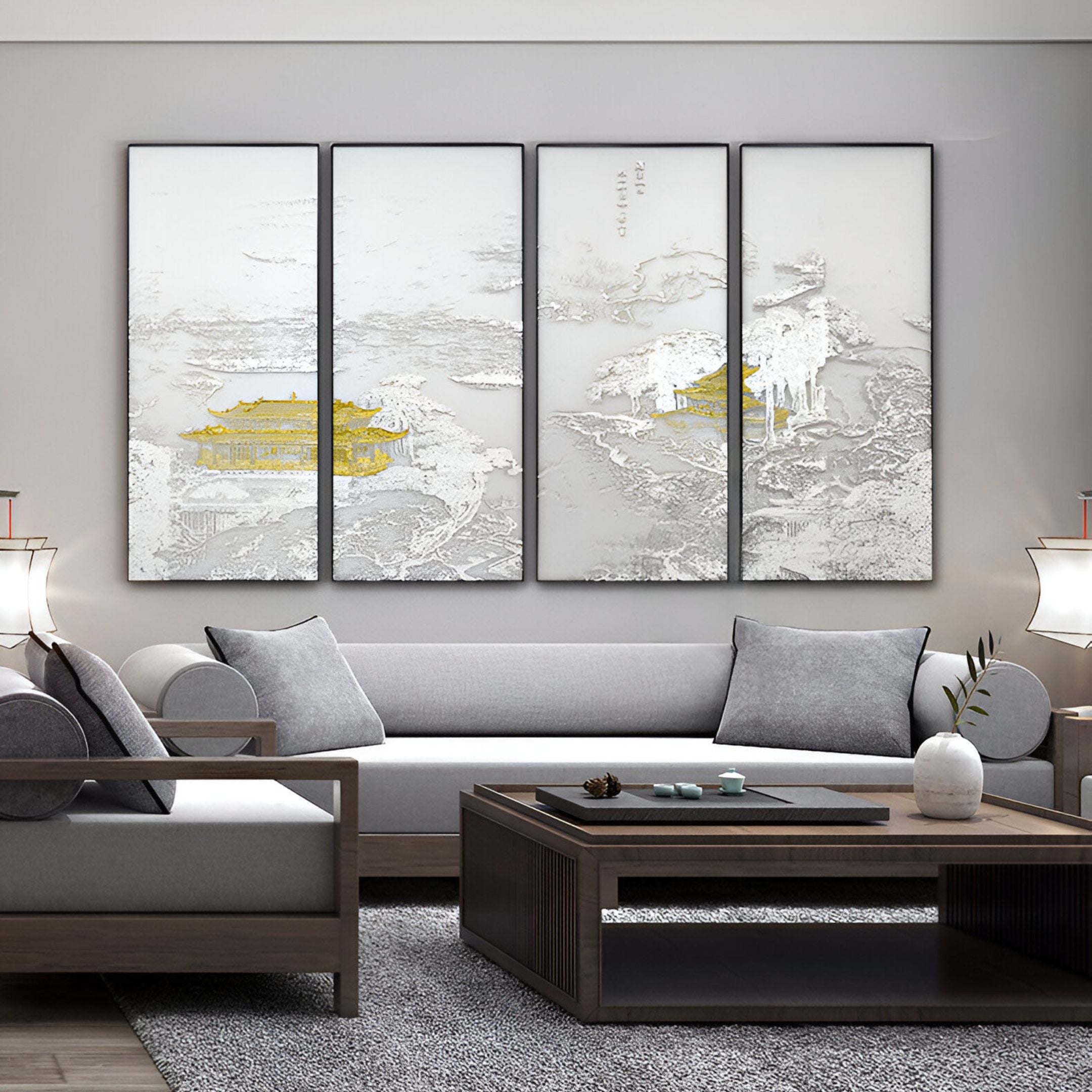 Stylish interior with a four-panel wall art installation, highlighting golden pagodas surrounded by textured silver details.