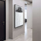 Vertical Silk Art panel showcasing monochromatic texture and contrast in a hallway.