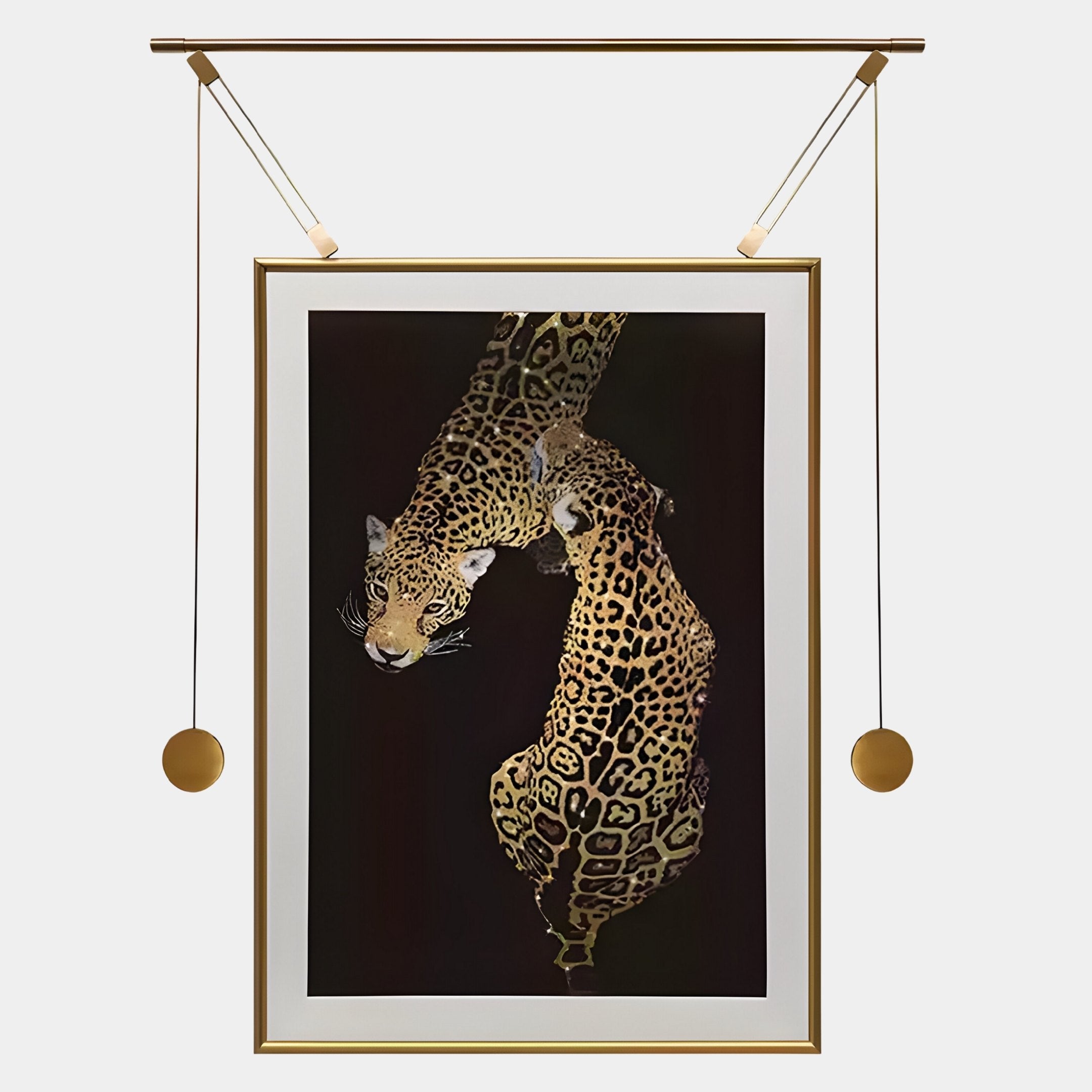 The Glacia Dual Jaguar Crystal Hanging Framed Wall Art by Giant Sculptures showcases two golden-furred jaguars on a black background in an elegant gold frame—an ideal statement piece for sophisticated interiors.