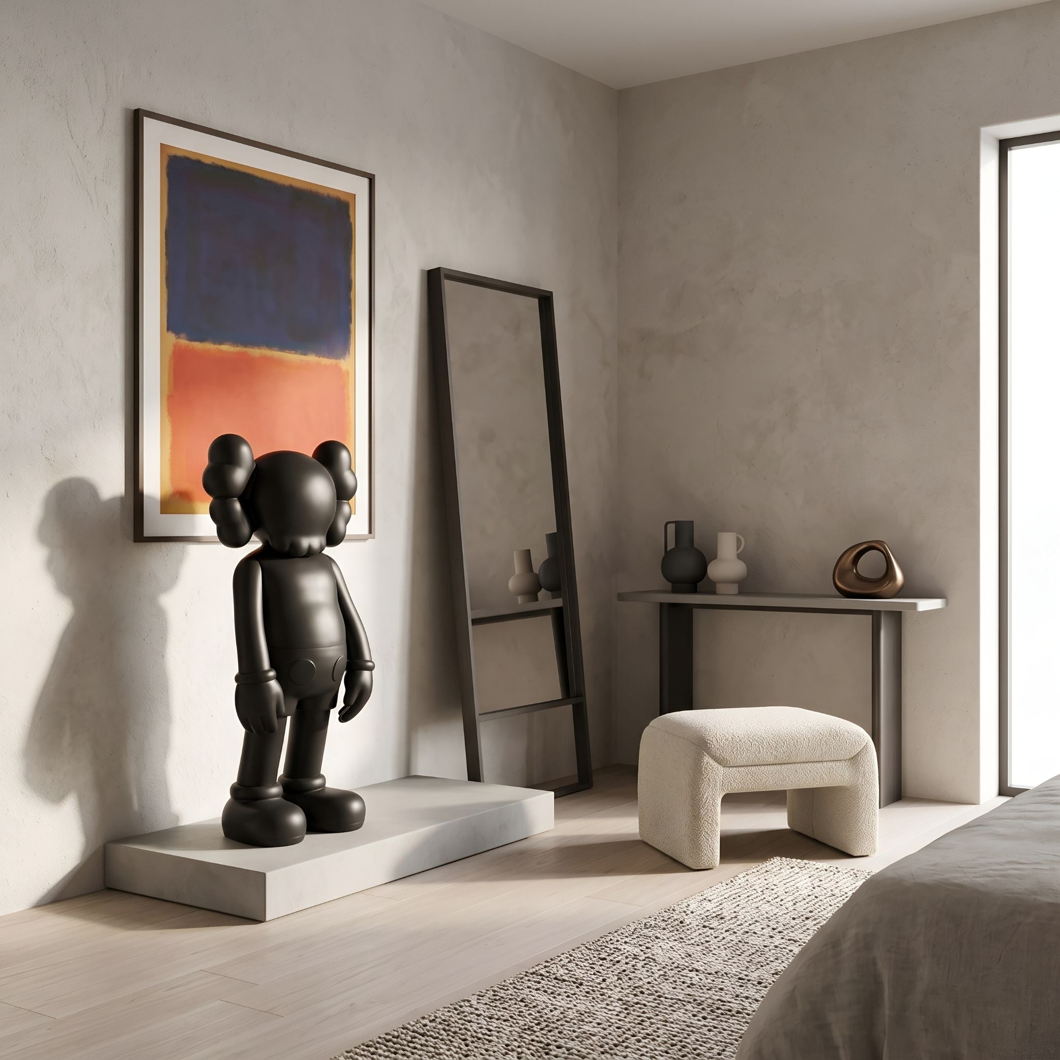Midnight Black Iconify Standing Sculpture (100cm) on a stone platform beside a mirror, in a bedroom with abstract wall art and a console table.
