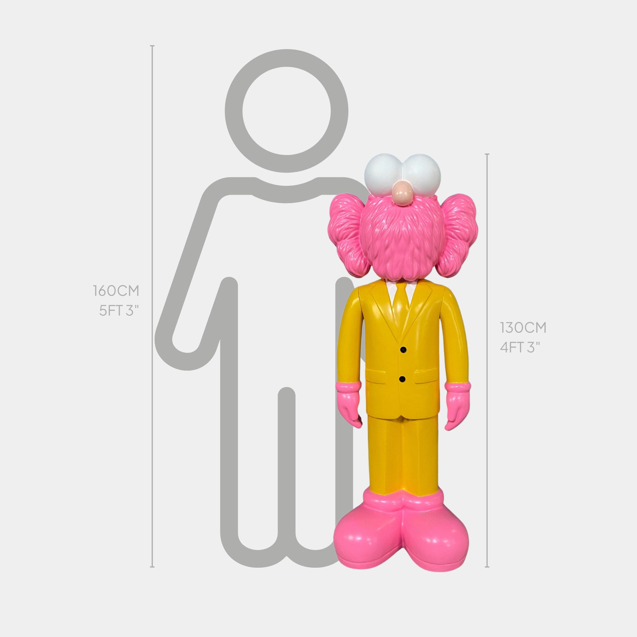 A yellow and pink cartoonish figure, the Giant Sculptures Sunbeam Yellow Suit Iconify CEO Sculpture (130cm), stands before a gray person outline, with measurement lines highlighting their heights.