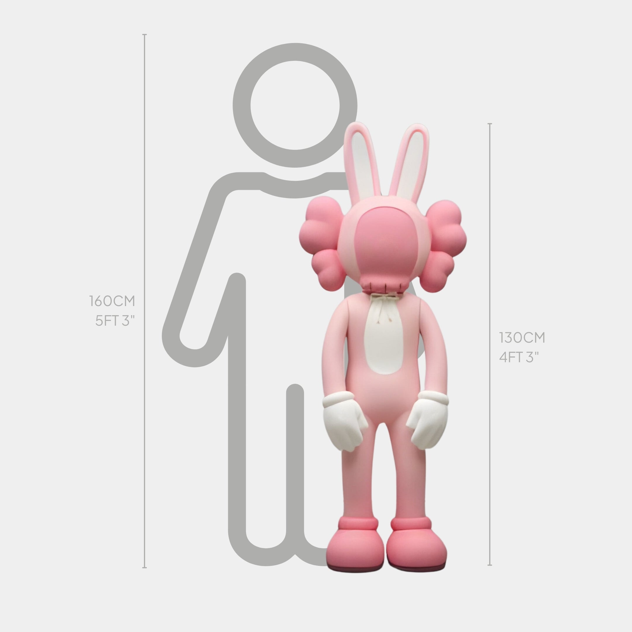 A Coral Pink Iconify Rabbit Sculpture by Giant Sculptures, standing at 130 cm (4 ft 3 in) with bunny ears and gloved hands, is displayed next to a grey silhouette of a human at 160 cm (5 ft 3 in), highlighting modern art with contemporary flair.