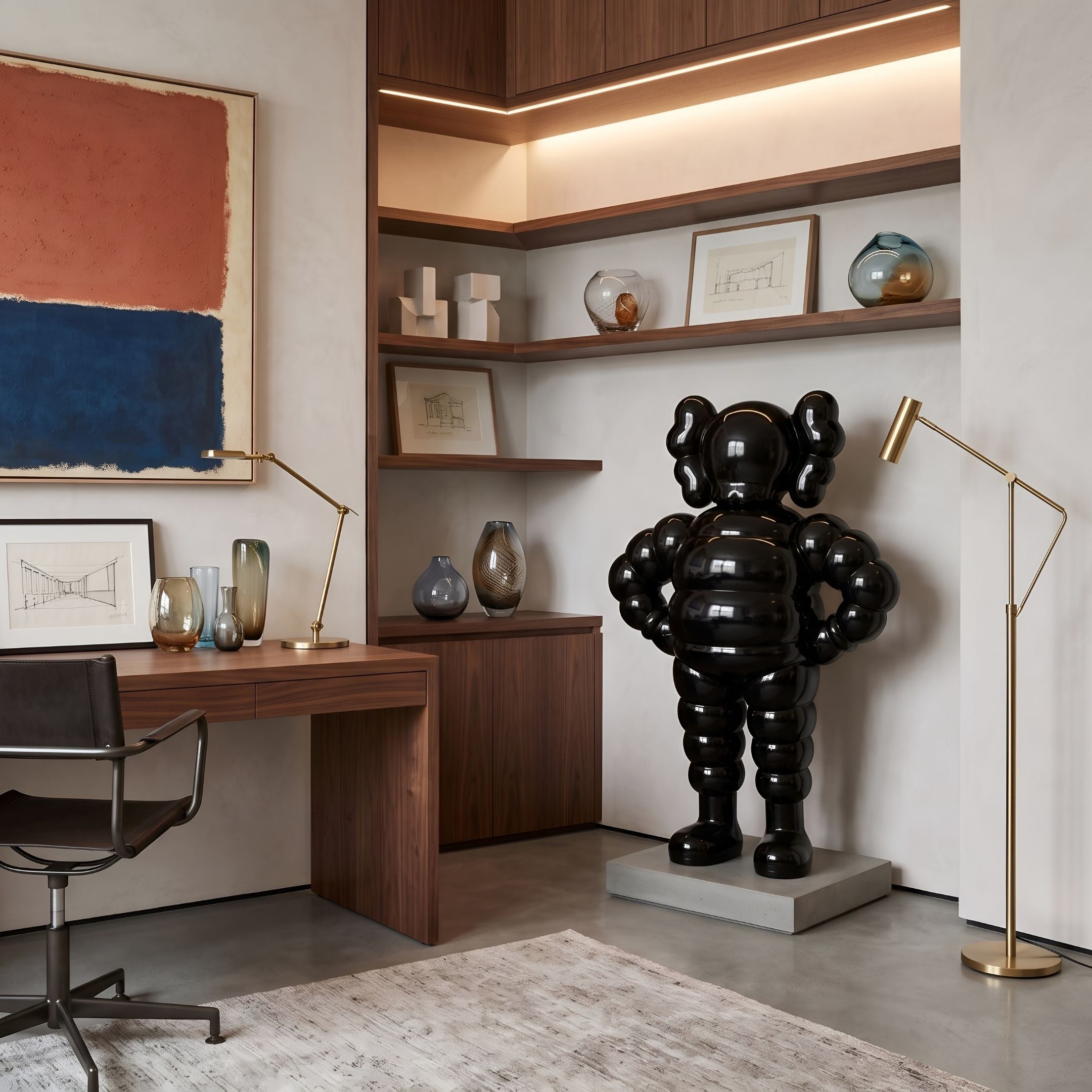 Obsidian Black Iconify Rollo Warrior Sculpture, 130cm, glossy black resin figure on a concrete base in a study beside a wood desk and shelving.