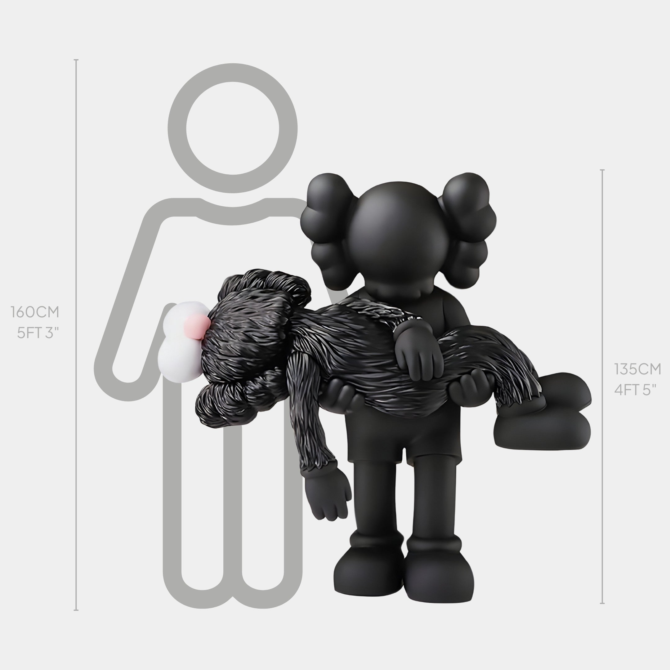 An Obsidian Black Iconify Rescuing Furry Sculpture by Giant Sculptures, reminiscent of contemporary art, features a dark cartoon-like figure with X eyes holding a smaller limp version. The backdrop shows scales at 5 ft 3 in and 4 ft 5 in heights.