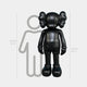 Midnight Black Iconify Standing Sculpture by Giant Sculptures shown from the back at 168cm beside a human silhouette for scale on a plain grey background.