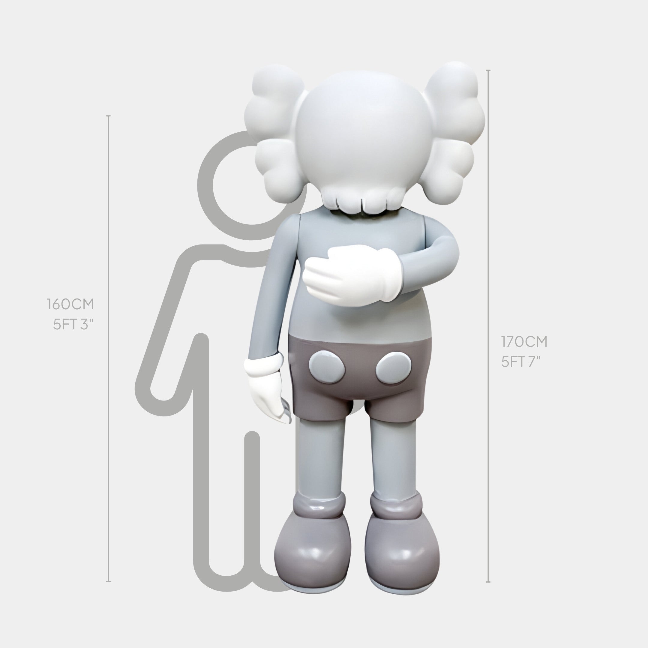 The Soft Grey Iconify II Dance Sculpture by Giant Sculptures is a 170 cm tall gray cartoon figure statue made from premium resin, facing forward with white gloves and exaggerated features, perfectly accentuating modern interiors alongside a 160 cm silhouette.