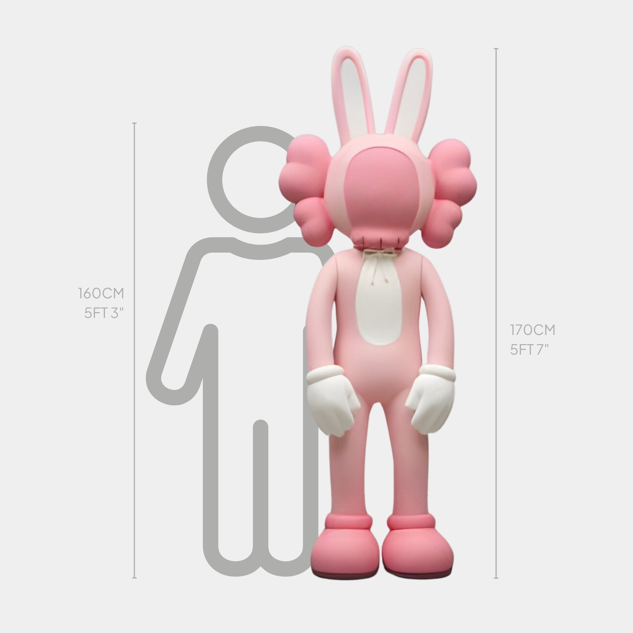 The Coral Pink Iconify Rabbit Sculpture, designed by Giant Sculptures, enchants with a cartoon-like charm and stands 170 cm tall beside a human figure. Its long ears and ruffled collar add whimsy to any modern art statue collection.