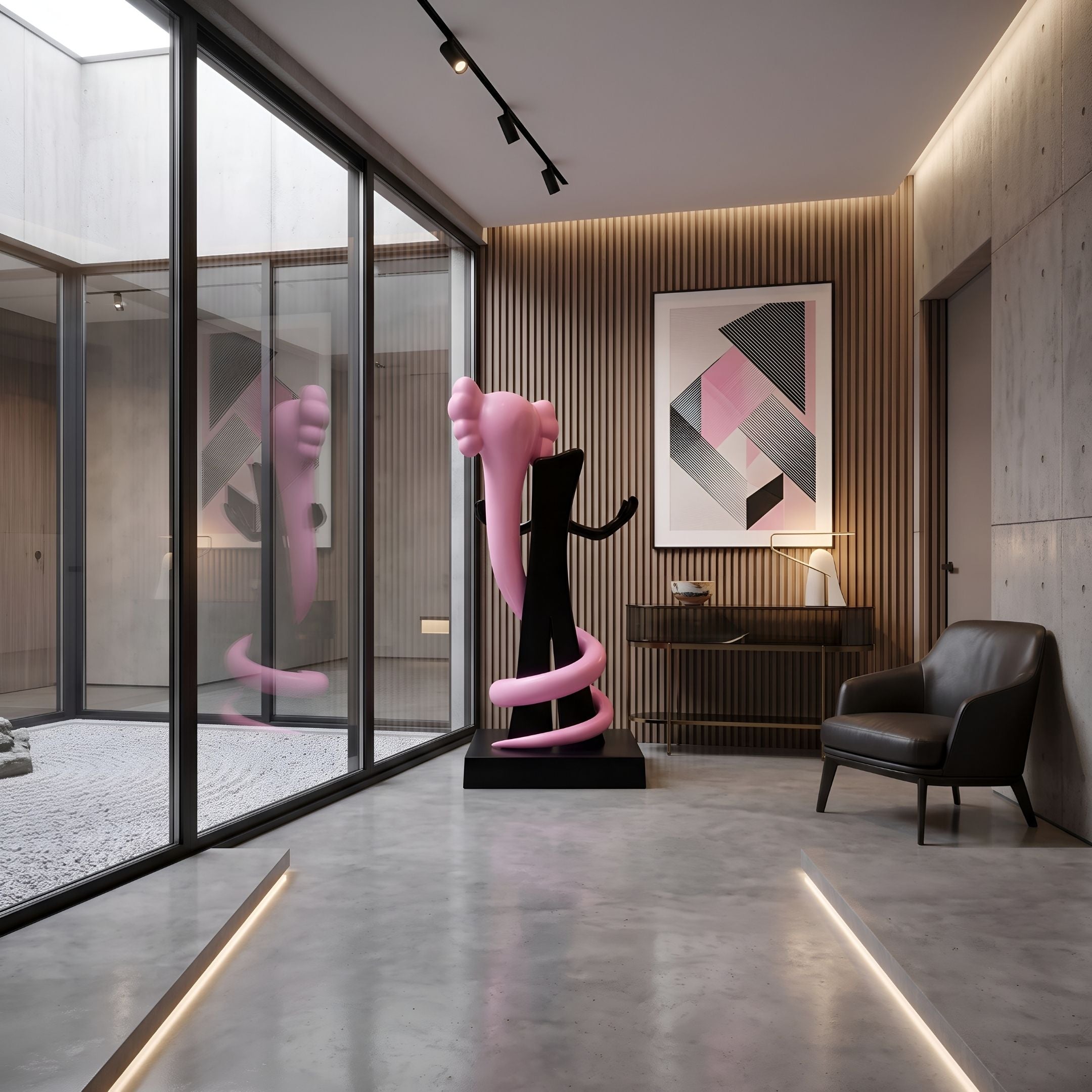 Petal Pink Iconify Snake Sculpture - 176cm, black abstract elephant form with coiling pink accents on a black base, shown in a modern lounge near a leather armchair and geometric wall art.