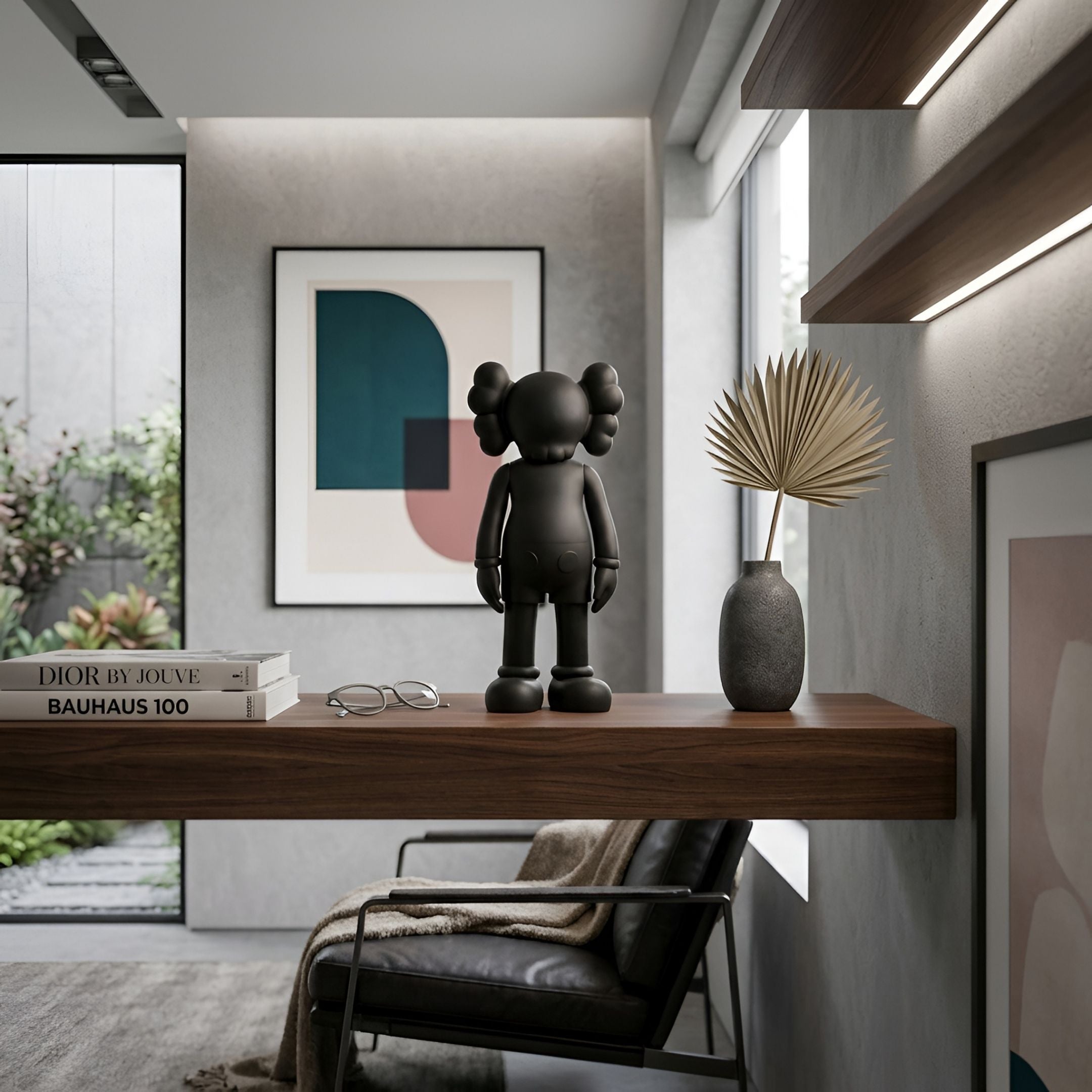 Midnight Black Iconify Standing Figure, 20cm matte black sculpture on a wooden shelf beside books, glasses, and a vase in a modern living room.