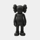 The Midnight Black Iconify Standing Figure by Giant Sculptures is a 20cm contemporary sculpture with a matte finish, cartoonish look, exaggerated features, large round ears, and X-shaped eyes that add a playful touch to any interior décor.