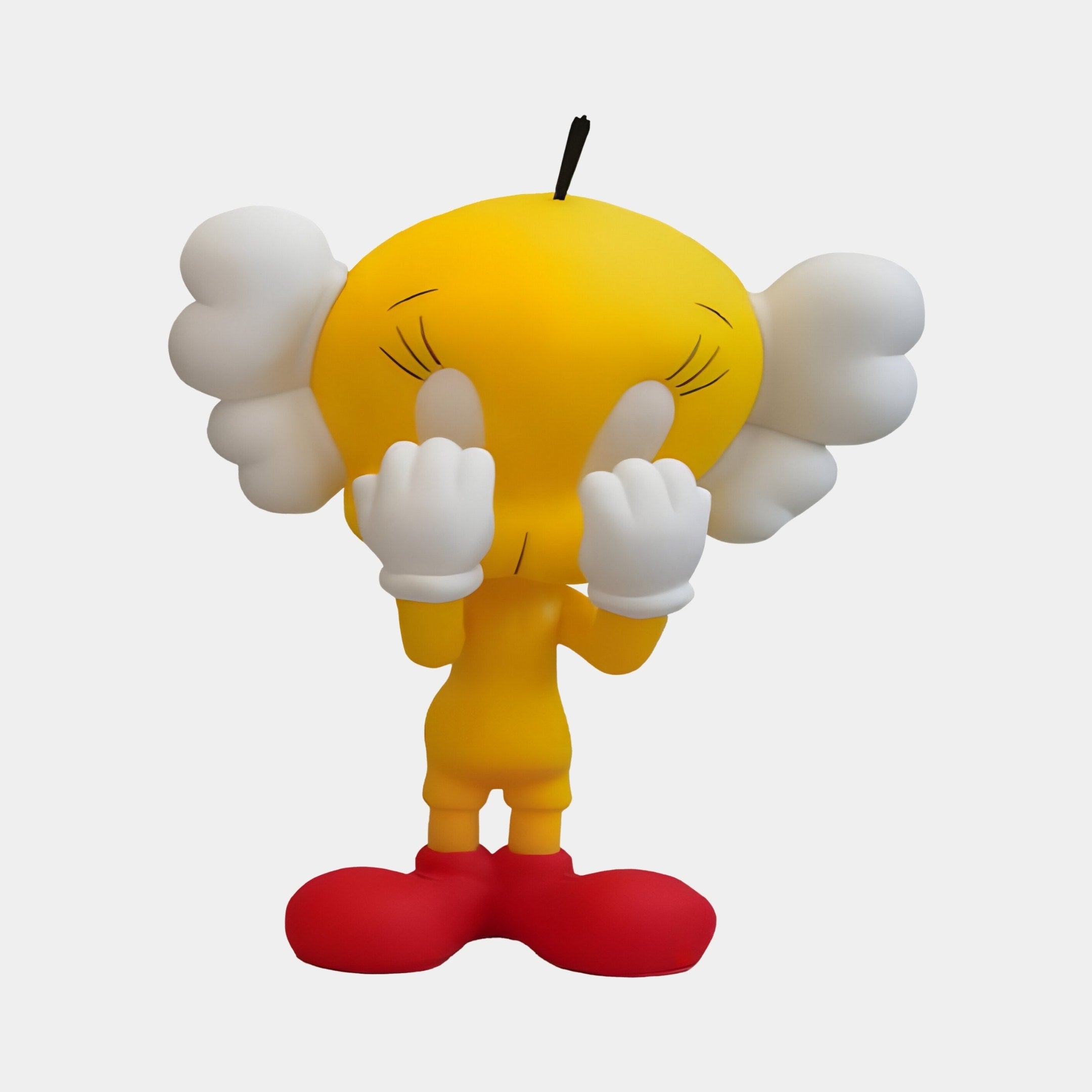 The 20cm Yellow Iconify Tweeto Figure by Giant Sculptures is perfect for pop-art enthusiasts, featuring a stylized yellow cartoon character covering its face with fluffy white ears and gloves, an antenna-like black hair strand, and red shoes, all set against a plain white background.