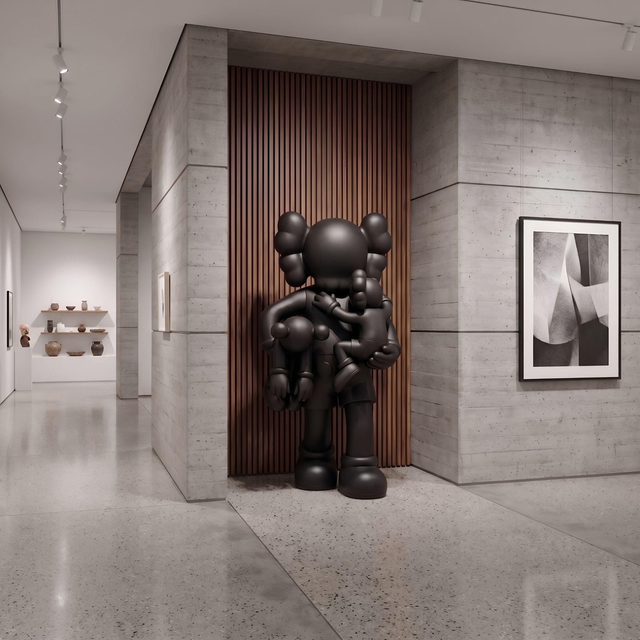 Midnight Black Iconify Family Sculpture, 200cm, matte black resin figures displayed in a gallery corridor with wood slat wall and concrete surfaces.