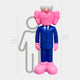 The Cobalt Blue Suit Iconify CEO Sculpture by Giant Sculptures stands tall at 200cm, featuring a colorful design with a fuzzy pink head, large white eyes, and pink ears against a height graphic backdrop adorned with contemporary art.