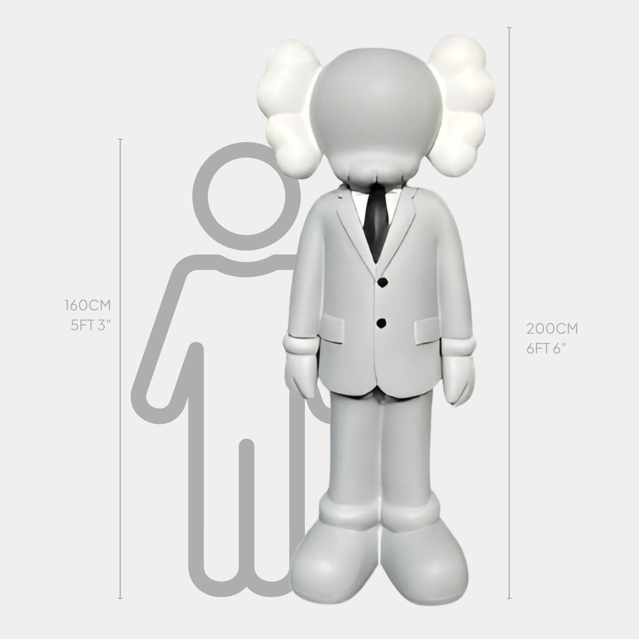 The Giant Sculptures Soft Grey Suit Iconify Director Sculpture, a pop-art styled figure with round eyes and X-shaped features, stands 200cm tall beside a 160cm silhouette. This gray cartoon-like sculpture is perfect for modern office decor.