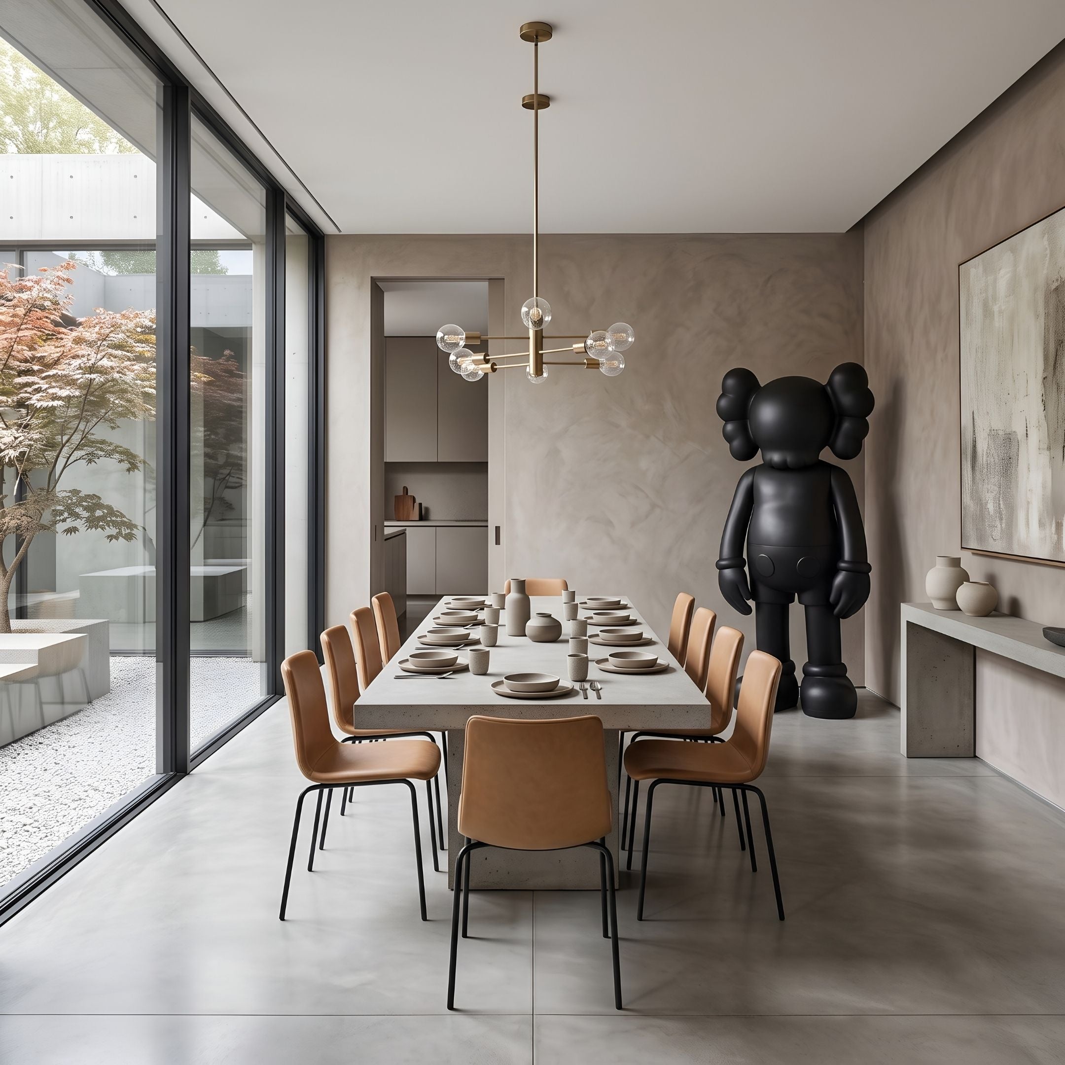 Midnight Black Iconify Standing Sculpture, 220cm, in a modern dining room beside a wood table and tan chairs against a plaster-toned wall.