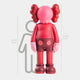 The Blush Ruby Iconify Standing Sculpture by Giant Sculptures features a cartoonish, human-like design with red and blush ruby colors, standing at 220 cm (7 ft 2 in). Perfectly fits modern interiors with background silhouettes showcasing various heights.