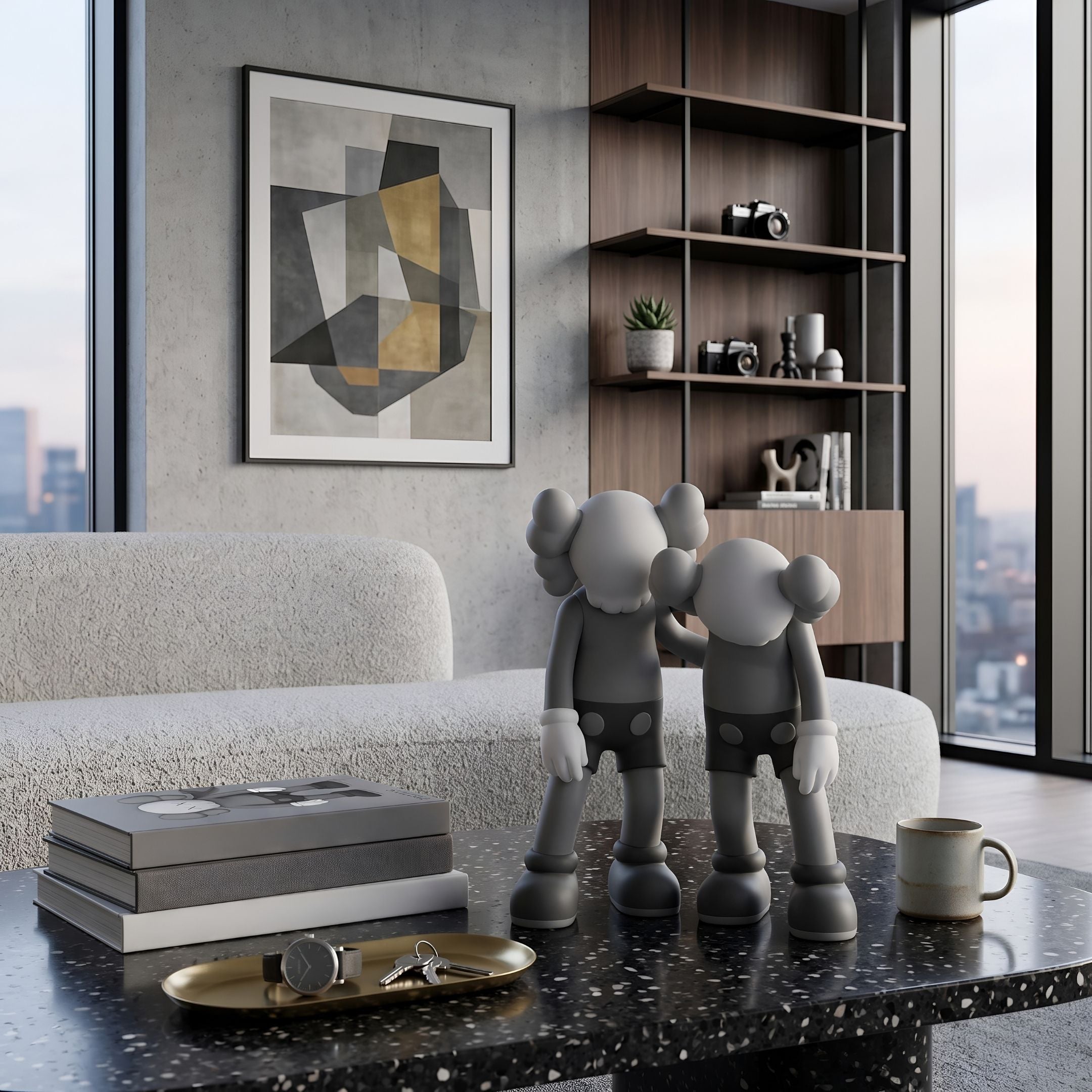 Slate Grey Iconify Friendship Figure, 28cm, displayed on a terrazzo coffee table in a living room with a beige sofa and wall art.