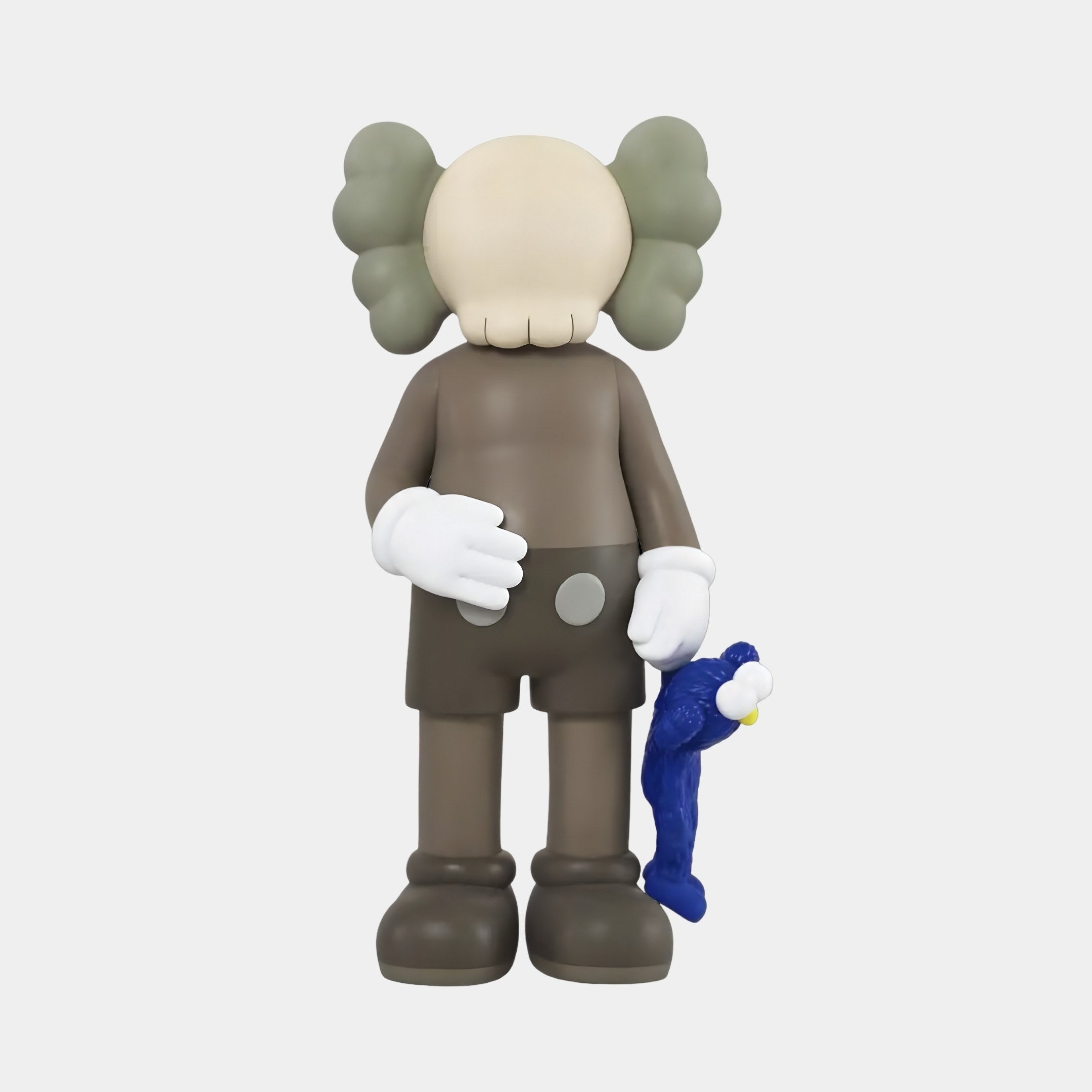 The 28cm Hazelnut Brown Iconify Blue Furry Toy Figure by Giant Sculptures is a collectible cartoon character with a featureless face, grey hair, and holds a blue doll. It features large gloves and boots, standing as a statement piece against a plain white background.