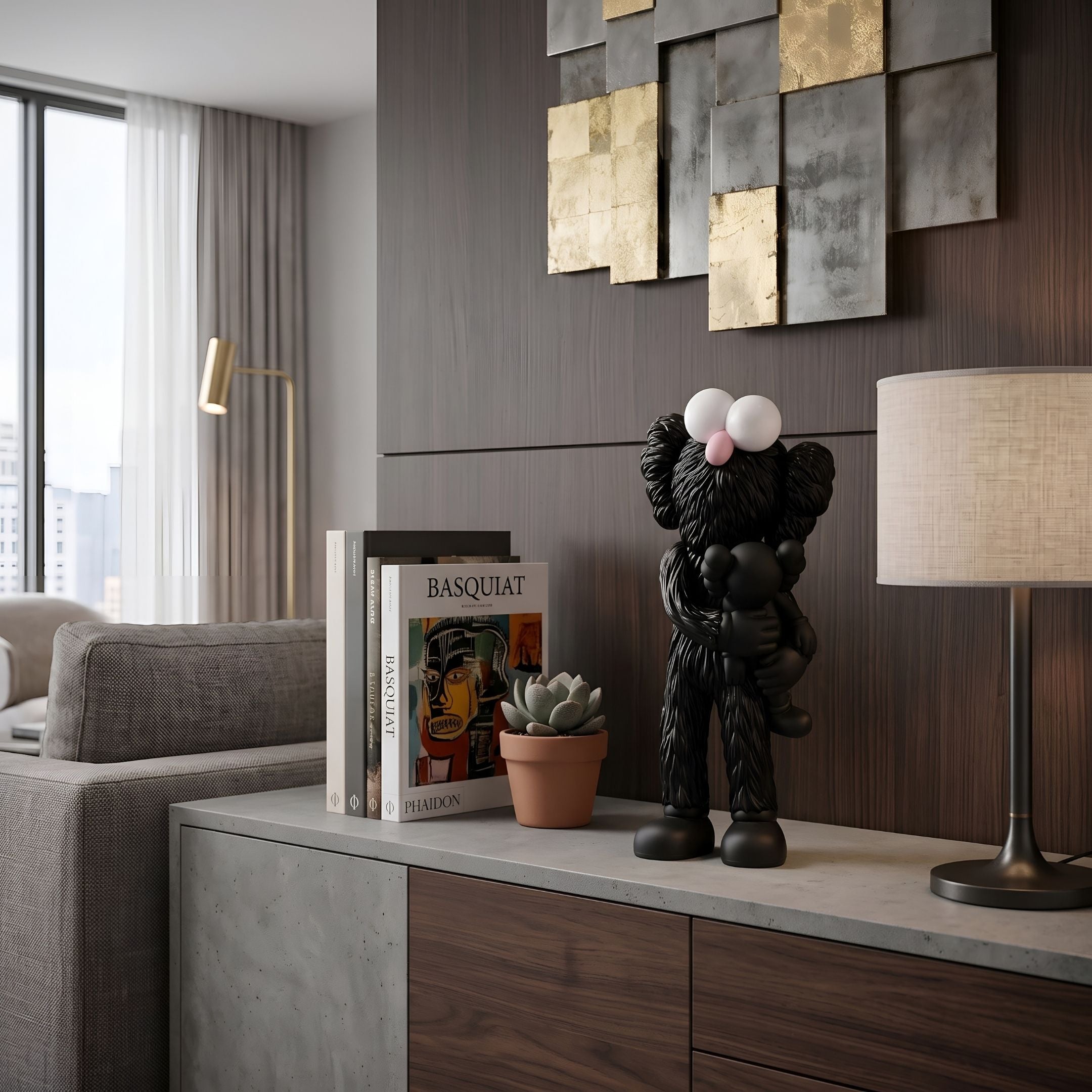 Obsidian Black Iconify Loving Furry Figure, 28cm, on a console table beside books and a lamp in a modern living room setting.