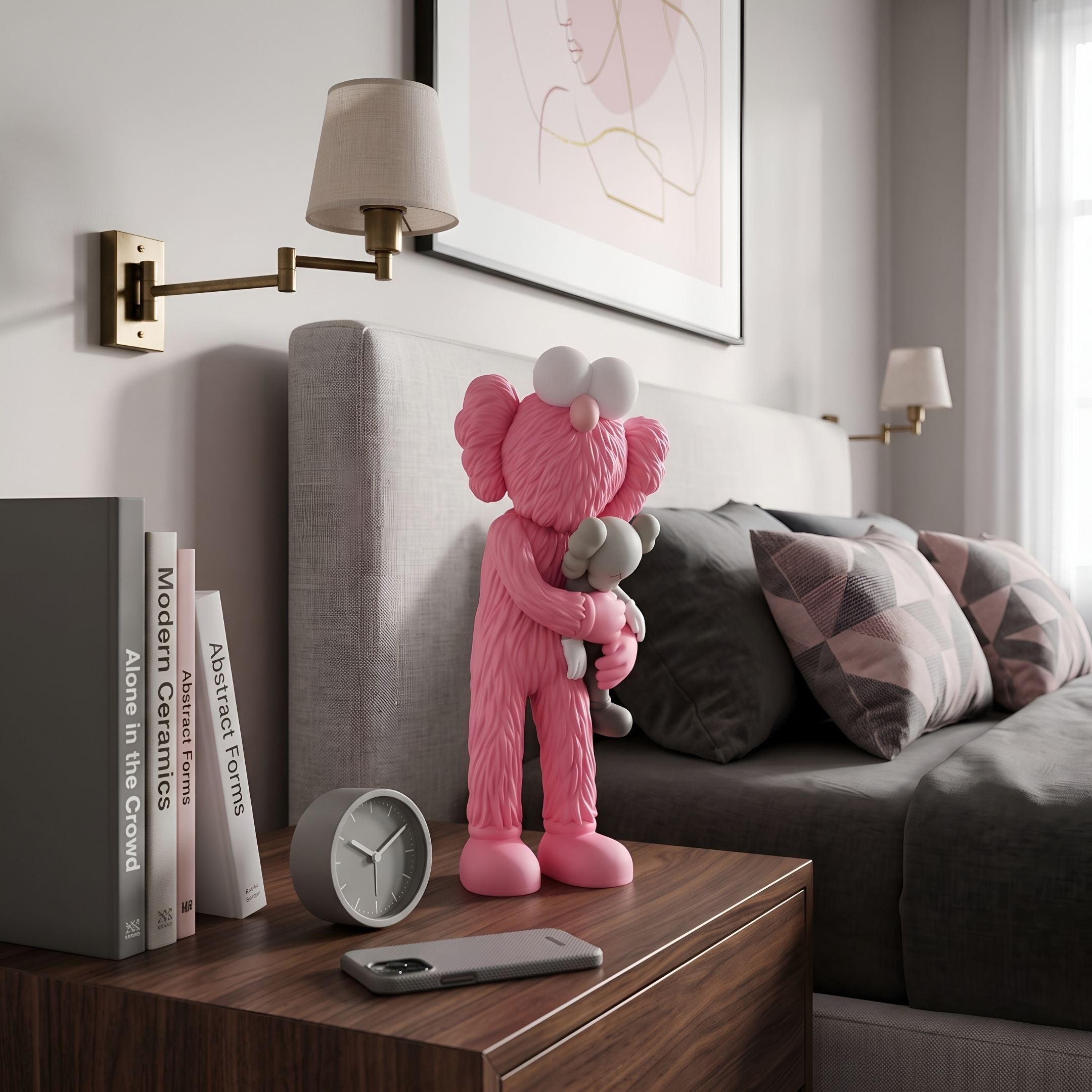 Petal Pink Iconify Loving Furry Figure, 28cm, pink furry character hugging a small grey figure, displayed on a bedroom nightstand near books and a clock.