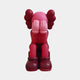 The Giant Sculptures Blush Ruby Iconify Melancholy Sitting Figure - 28cm is a cartoonish resin sculpture featuring a sitting figure with exaggerated gloves and shoes, its face hidden in its hands. It has iconic charm, with large round shapes resembling ears or hair enhancing the design.