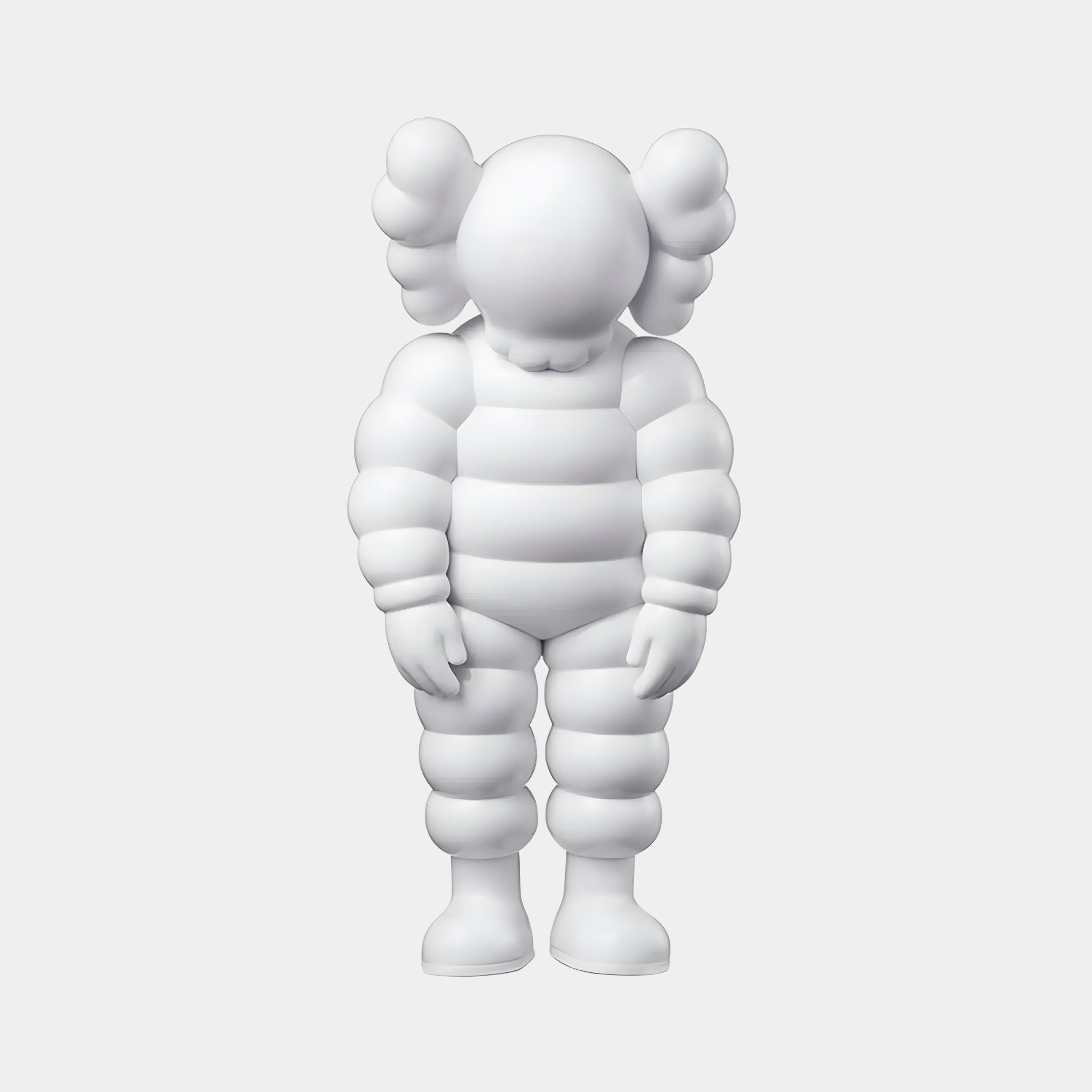 The Cloud White Iconify Rollo Figure by Giant Sculptures, 28cm tall, features an abstract humanoid design with padded limbs and a head resembling an inflated suit. Its cartoonish ears and minimalist, featureless face enhance its appeal for contemporary interiors against a plain white backdrop.