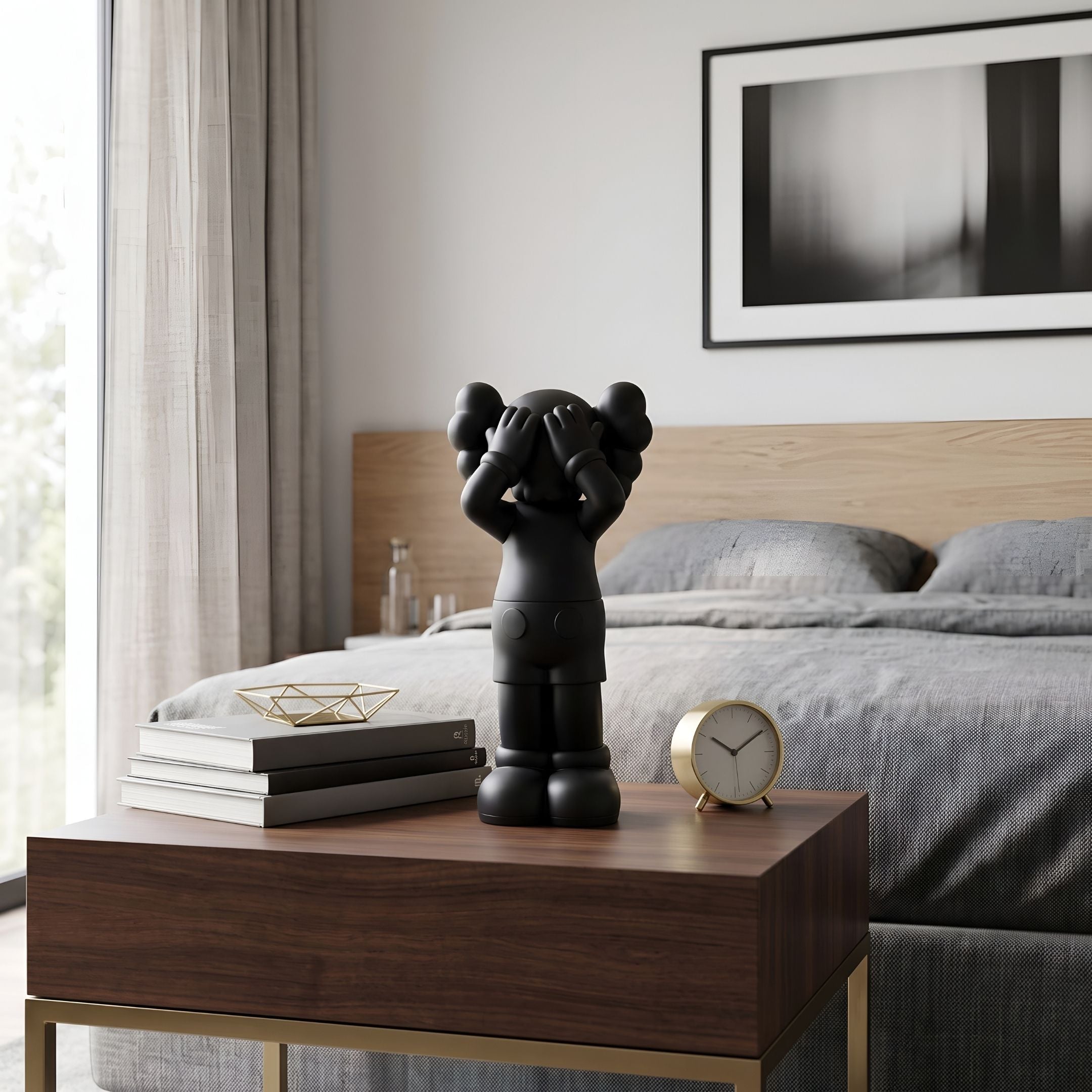 Midnight Black Iconify Silent Cry Figure, 28cm, on a walnut nightstand with books and a gold clock in a bedroom beside a bed with grey linens.