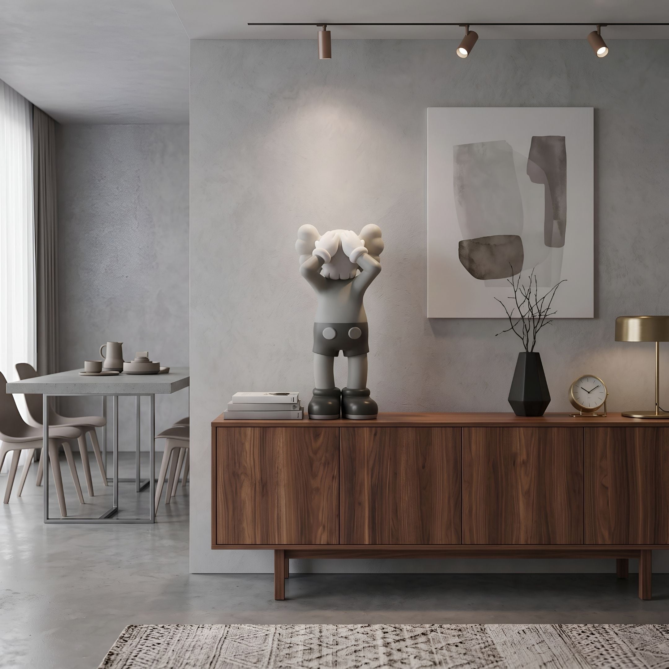 Soft Grey Iconify Silent Cry Figure, 28cm, displayed on a walnut sideboard beside books and a vase in a modern living room setting.