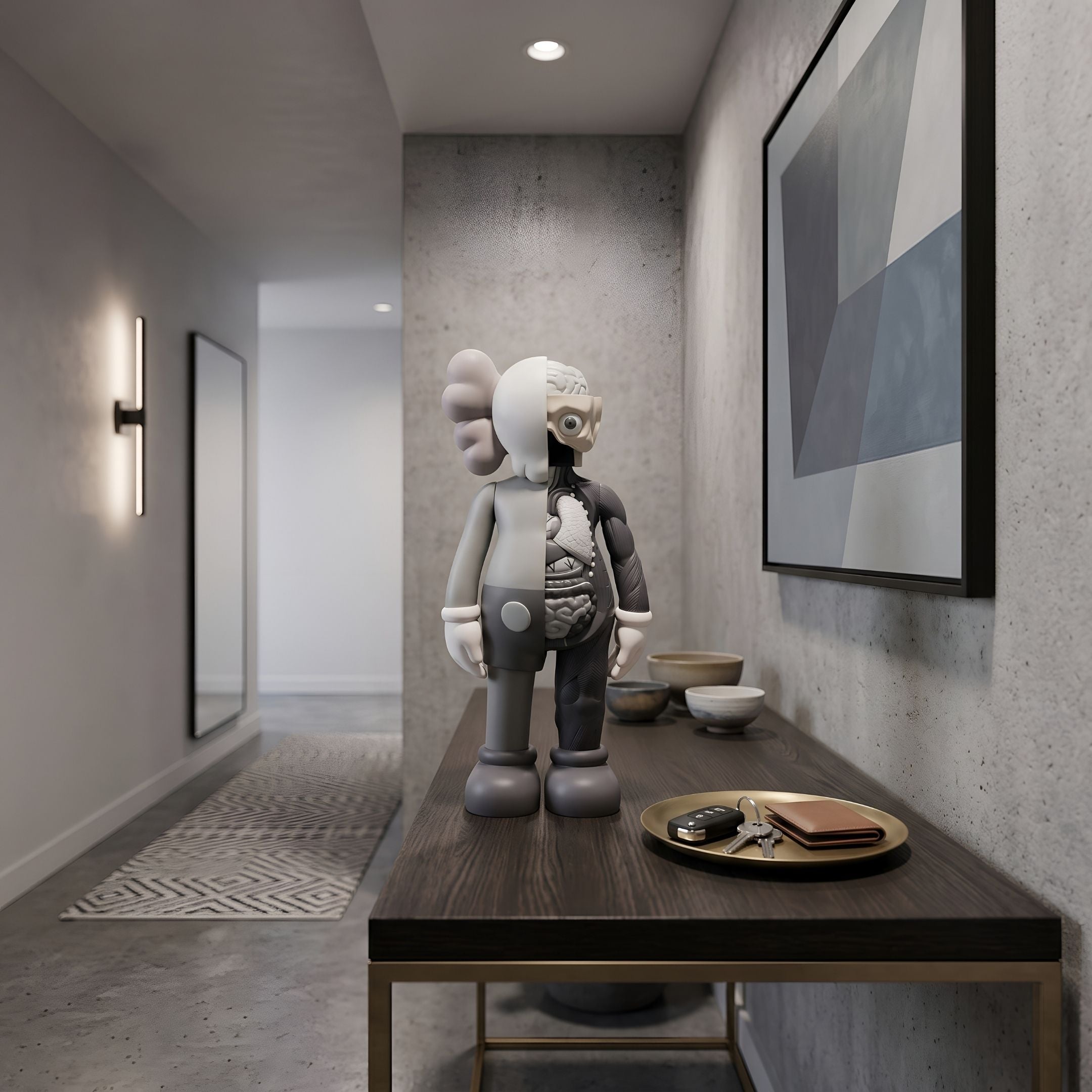 Soft Grey Iconify Anatomy Figure, 28cm, displayed on a console table in an entryway with wall art, bowls, and keys nearby.