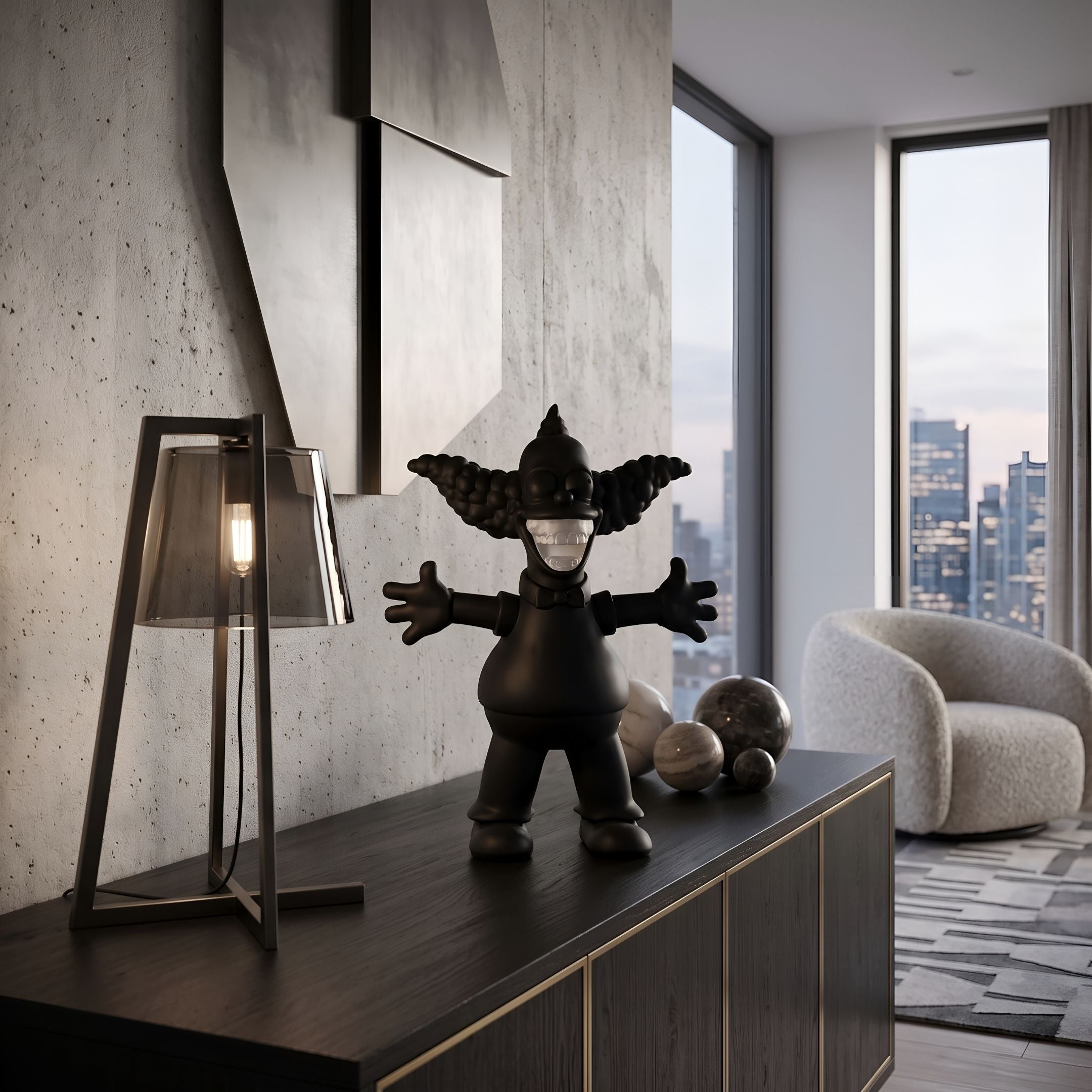 Obsidian Black Iconify Chuckle Figure, 30cm, on a dark sideboard with a table lamp and decorative spheres in a modern living room with city-view windows.