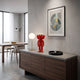 Fiery Red Iconify Furry Figure, 30cm collectible with textured surface and oversized eyes, displayed on a sideboard in a modern dining room.