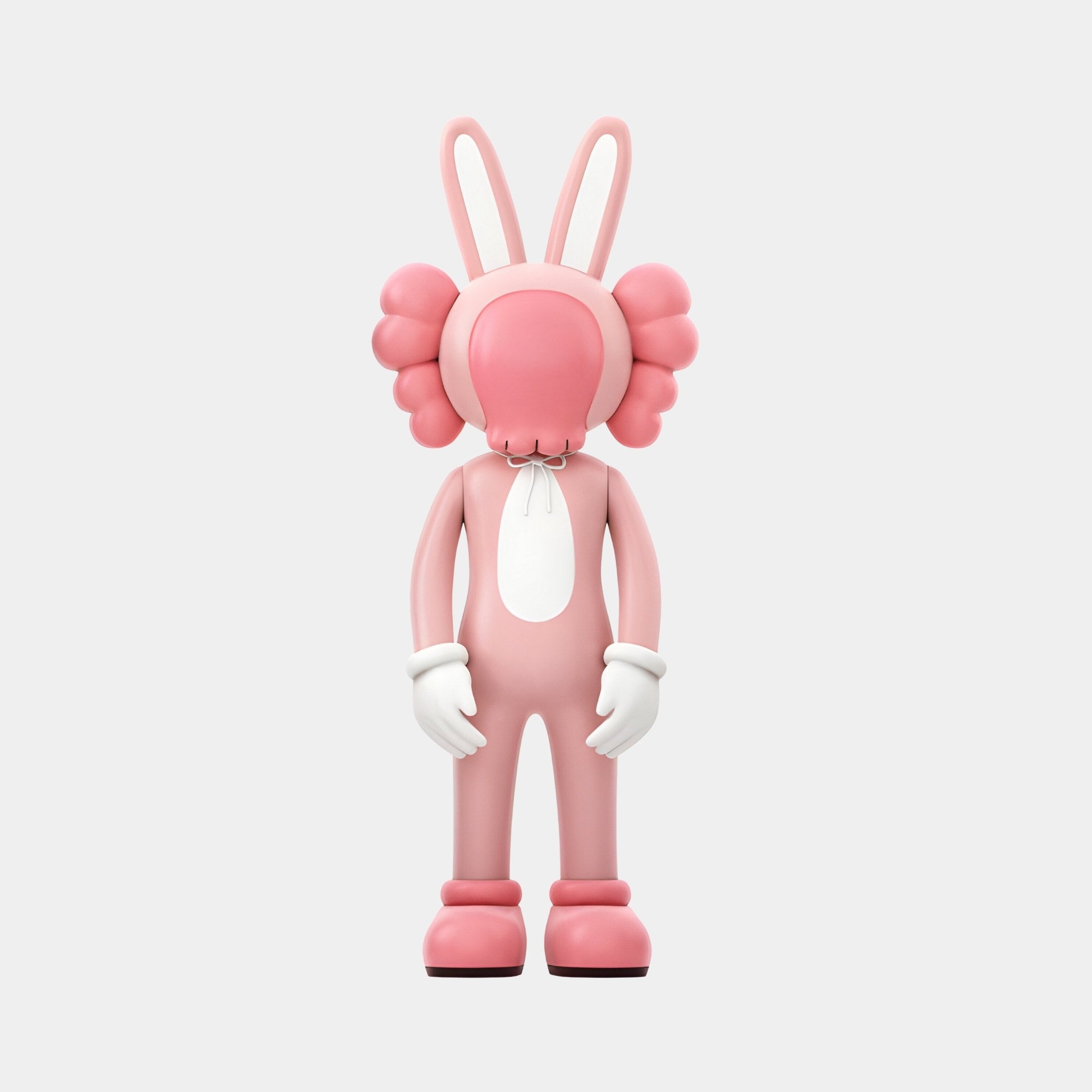 The Petal Pink Iconify Rabbit Figure by Giant Sculptures is 30cm and made of resin. It wears a bunny-like suit with large rounded ears, puffy cheeks, white oval on its chest, and white gloves, standing gracefully on a plain white background.