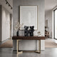 Iconify I All-Together Figure by Giant Sculptures, black stylised figures grouped on a wood console table beside a vase and framed line-art print.