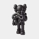 The Midnight Black Iconify Family Figure by Giant Sculptures is a 38cm resin sculpture featuring a black abstract humanoid with large shoes and cartoonish features, holding two playful smaller figures for a whimsical, contemporary design.