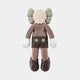 The 38cm Hazelnut Brown Iconify Flat Figure by Giant Sculptures is a cartoon-like character with a round, featureless face, gray crossed gloves, and shoes. It sports dark shorts with two buttons and features X-shaped eyes with puffy gray ears, perfect for contemporary interiors.